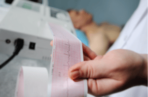 Clinic cardiology heart rhythm and pulse test closeup.